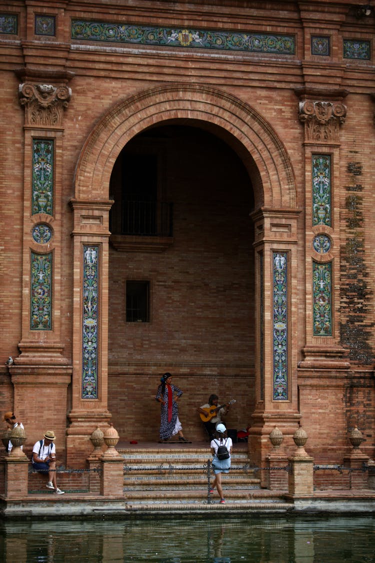 Ancient Brick Entrance To Building On Water