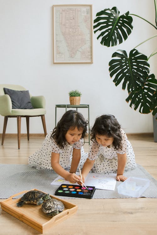 Free Little Twin Girls Painting  Stock Photo