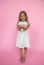 Girl in Yellow and White Polka Dot Dress