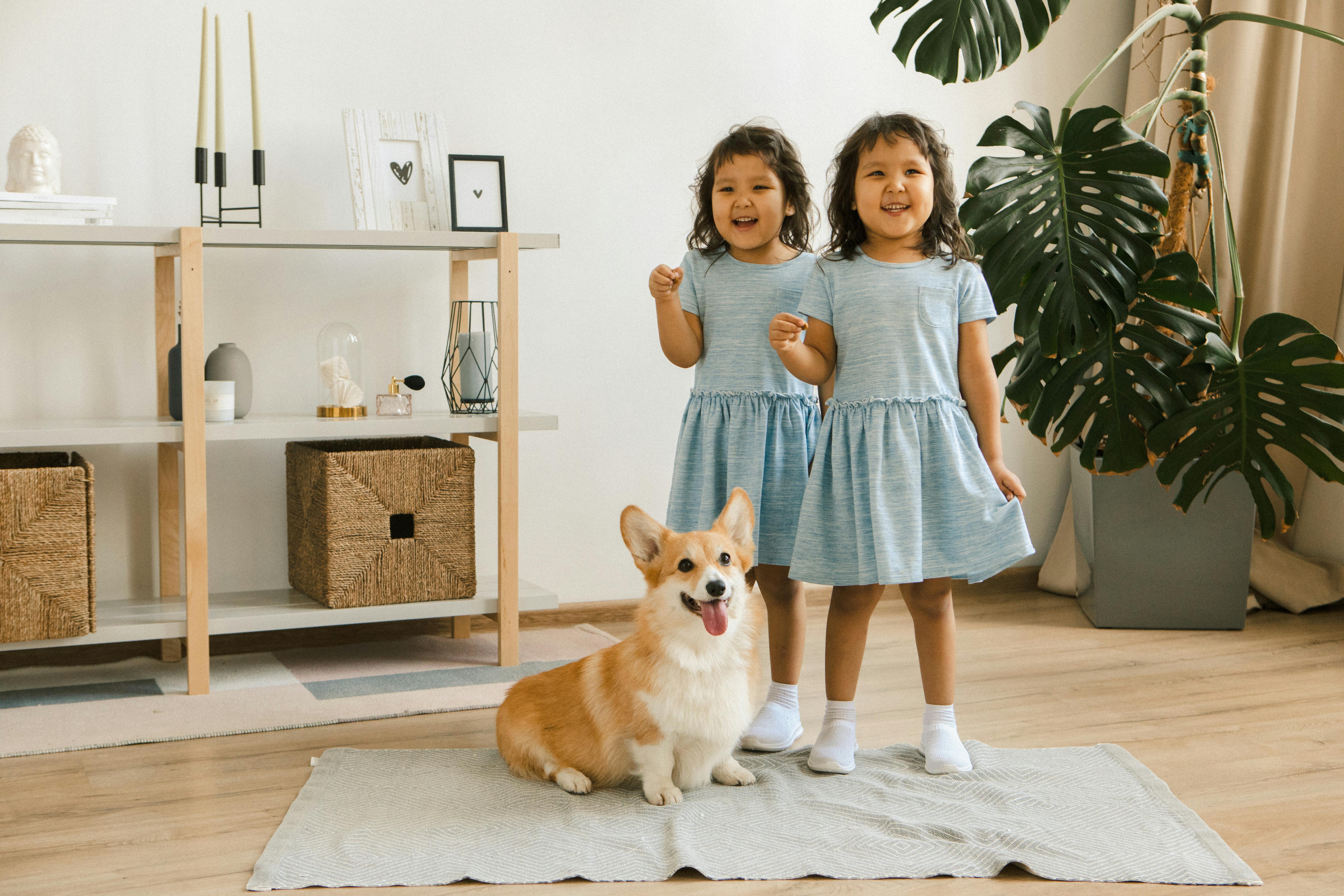 two girls with a dog