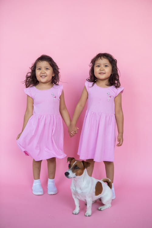 Free 2 Girl in Pink Dress Standing Stock Photo