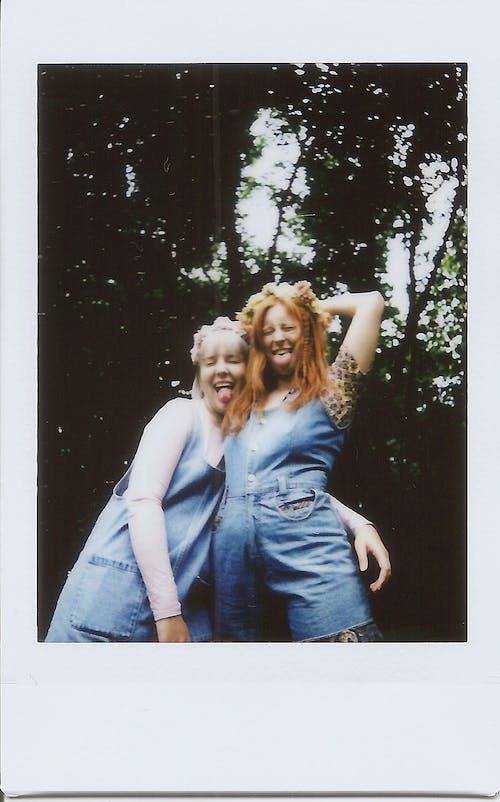 Polaroid Photo of Women in Denim Jumper