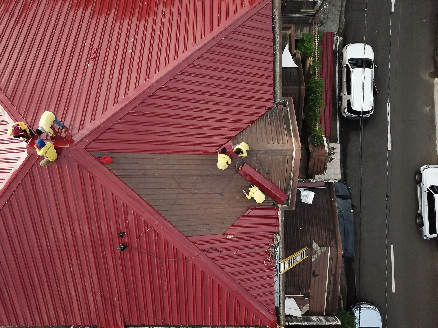 Roofing team working on a home
