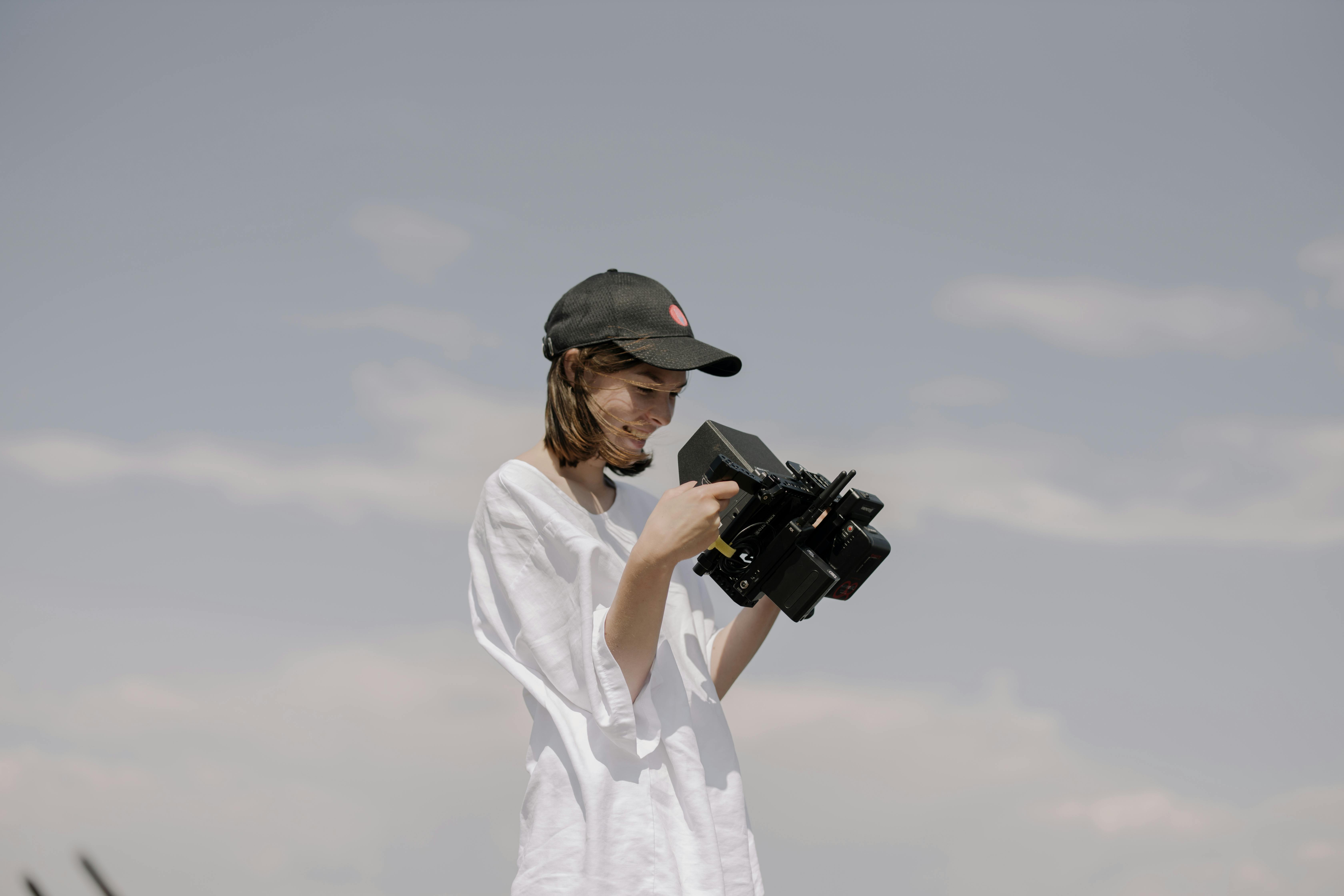 a woman holding a camera