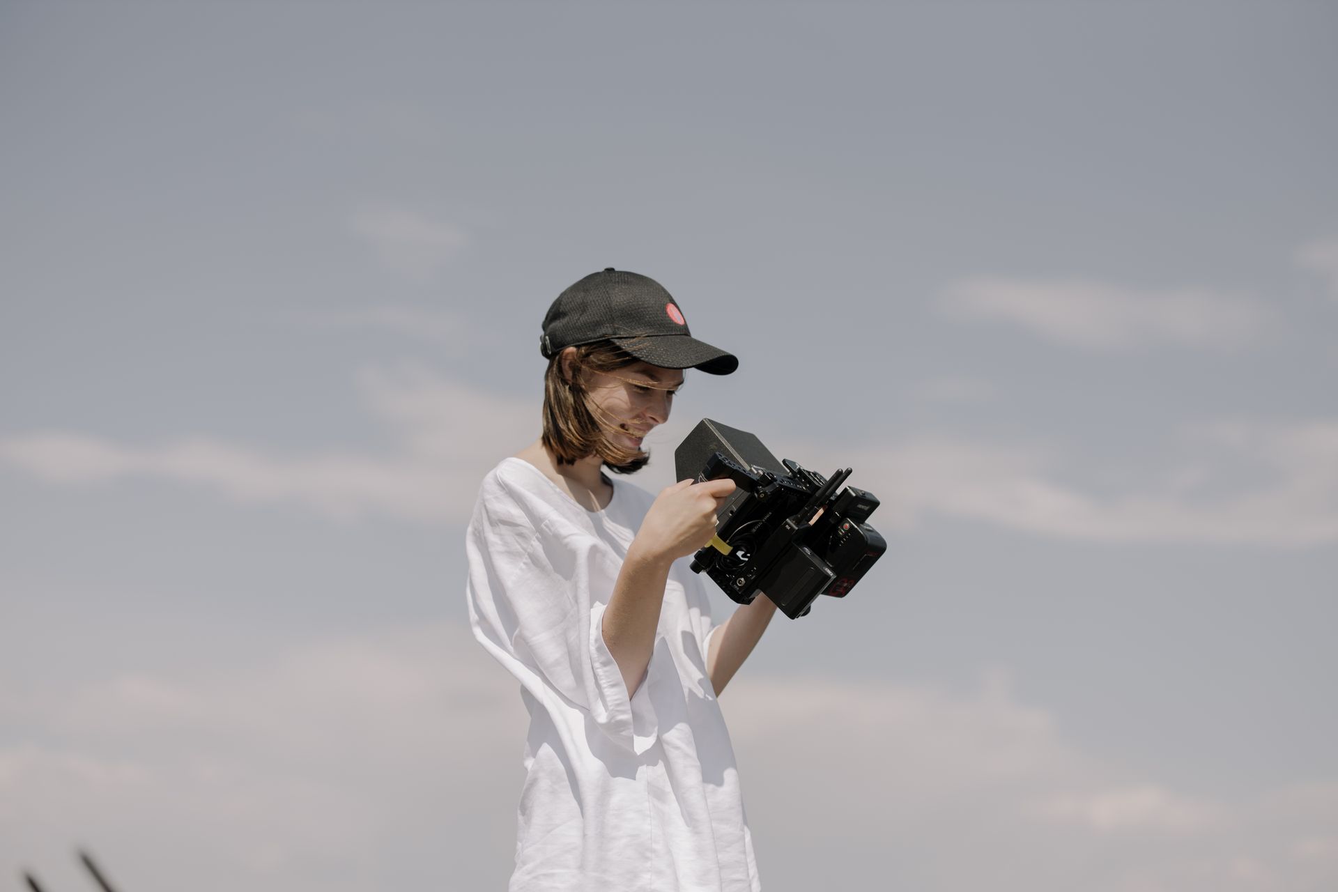 A Woman Holding a Camera