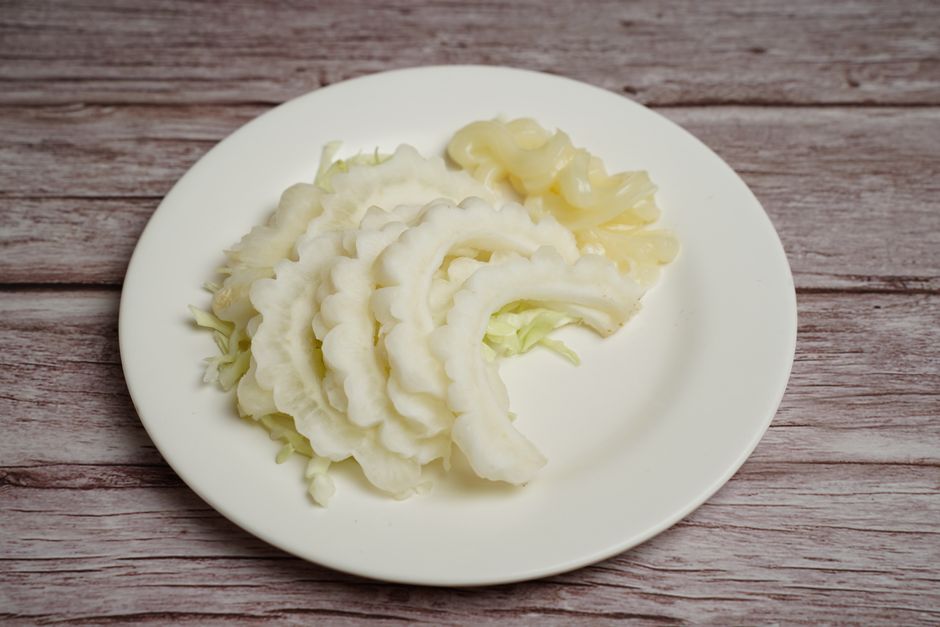 A bowl of bitter melon soup with soybeans, a traditional Xiaoshu dish