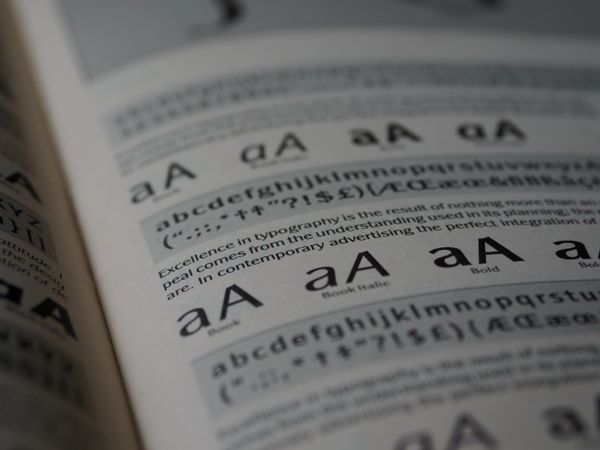 Close-up of printed type specimens in a book — photo by Brett Jordan on Pexels