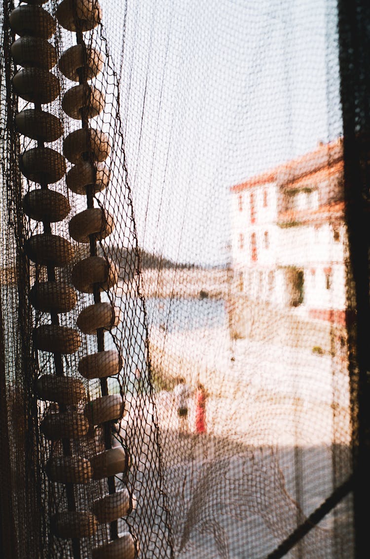 Close-Up Shot Of A Fish Net