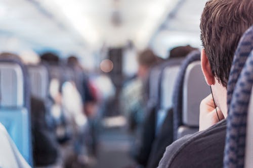 Foto profissional grátis de aeronave, homem, passageiros