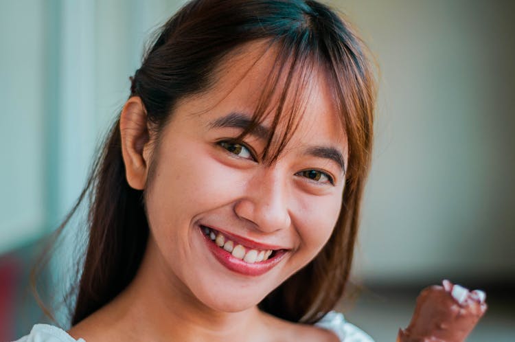 Happy Asian Woman With Ice Cream