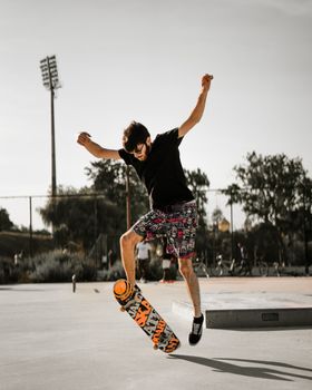 Skateboarder executing a trick at a skate park in Aveiro, Portugal.