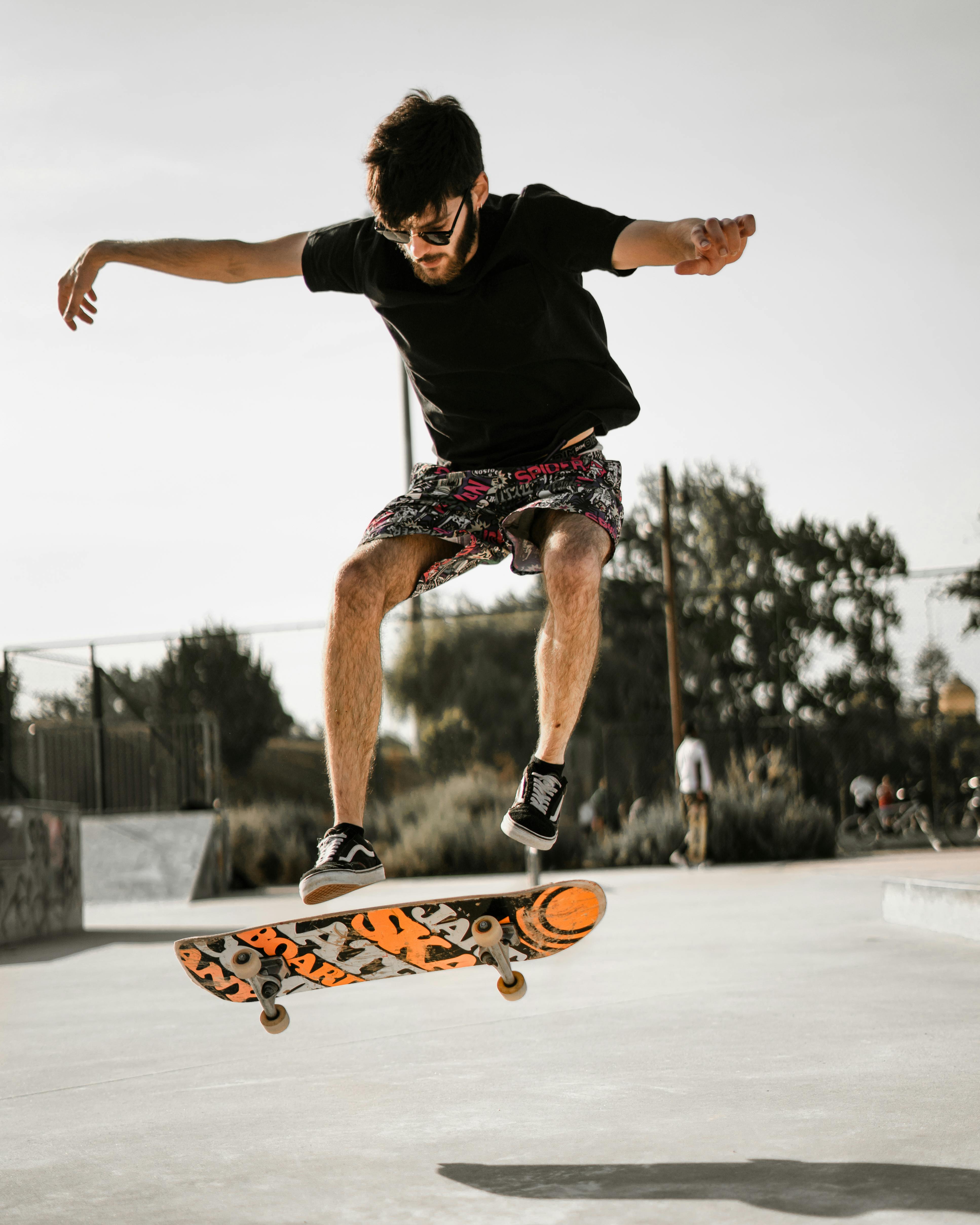 Man Doing A Skateboard Trick · Free Stock Photo