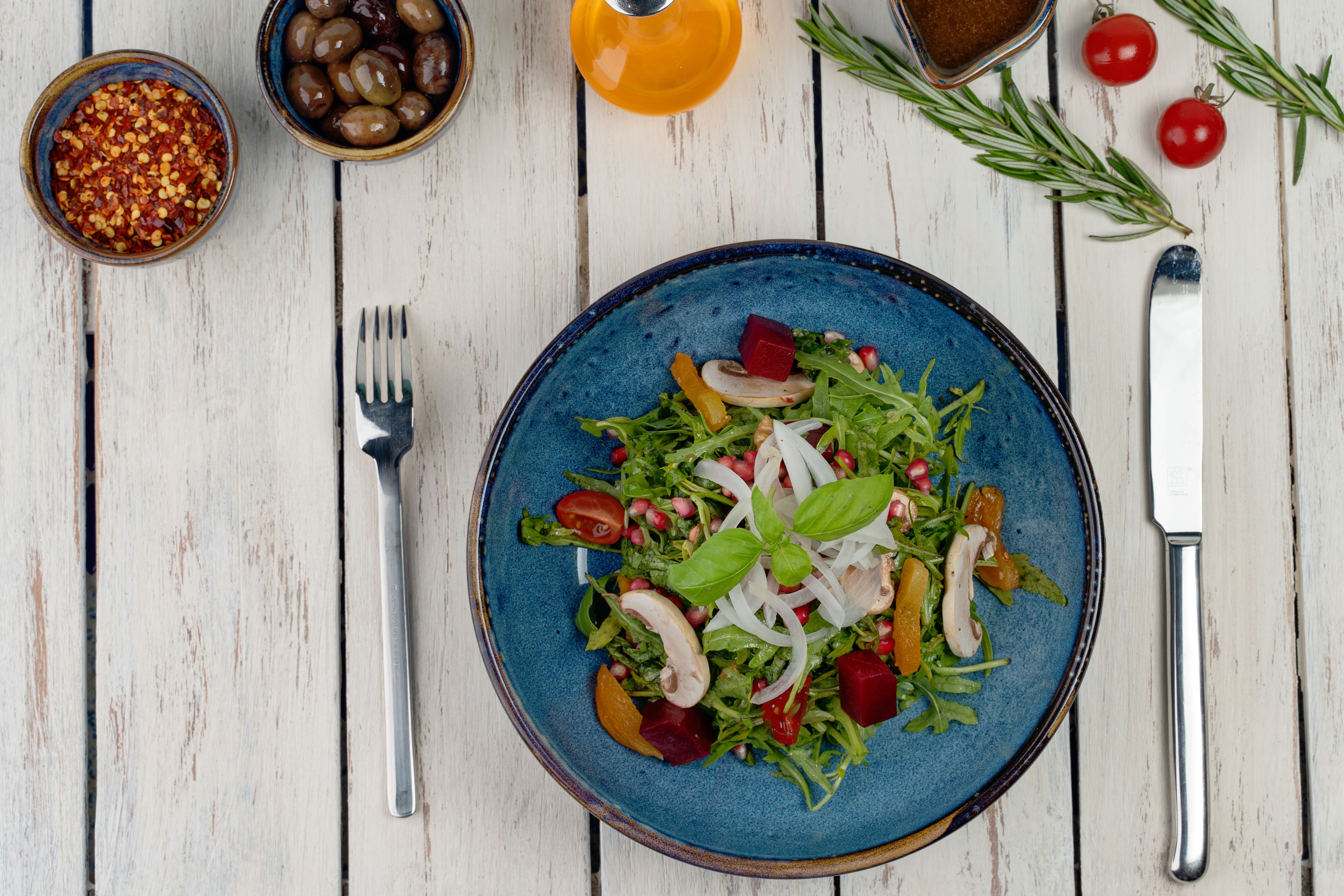 Roast vegetable salad with feta and balsamic served in a bowl