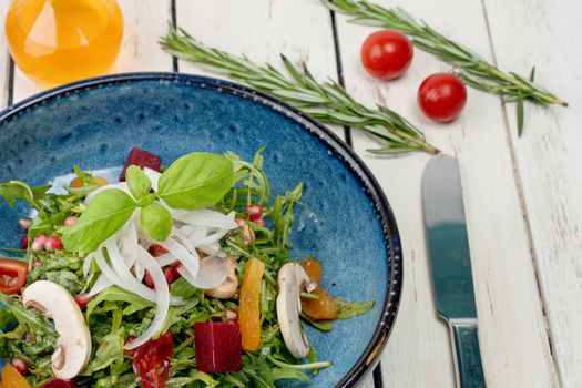 A vibrant bowl of healthy organic vegetable salad with fresh ingredients and garnishes in Dubai.