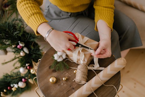 A Person Making Christmas Decorations