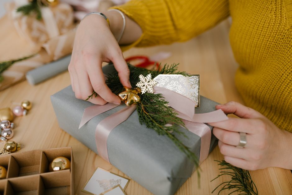 attaching large bow to present attaching large bow to present