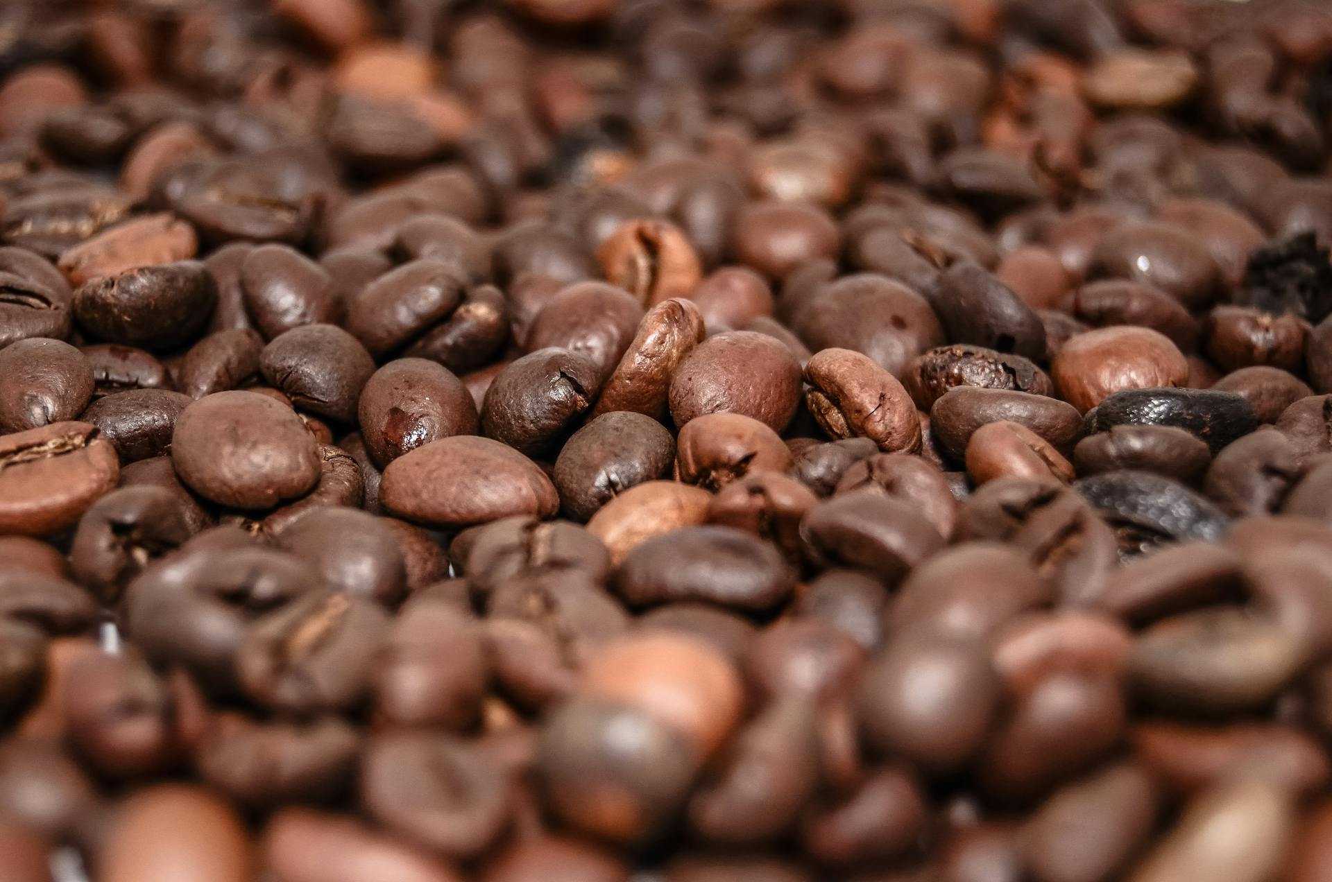 High-resolution macro shot of brown coffee beans, perfect for coffee-themed projects.