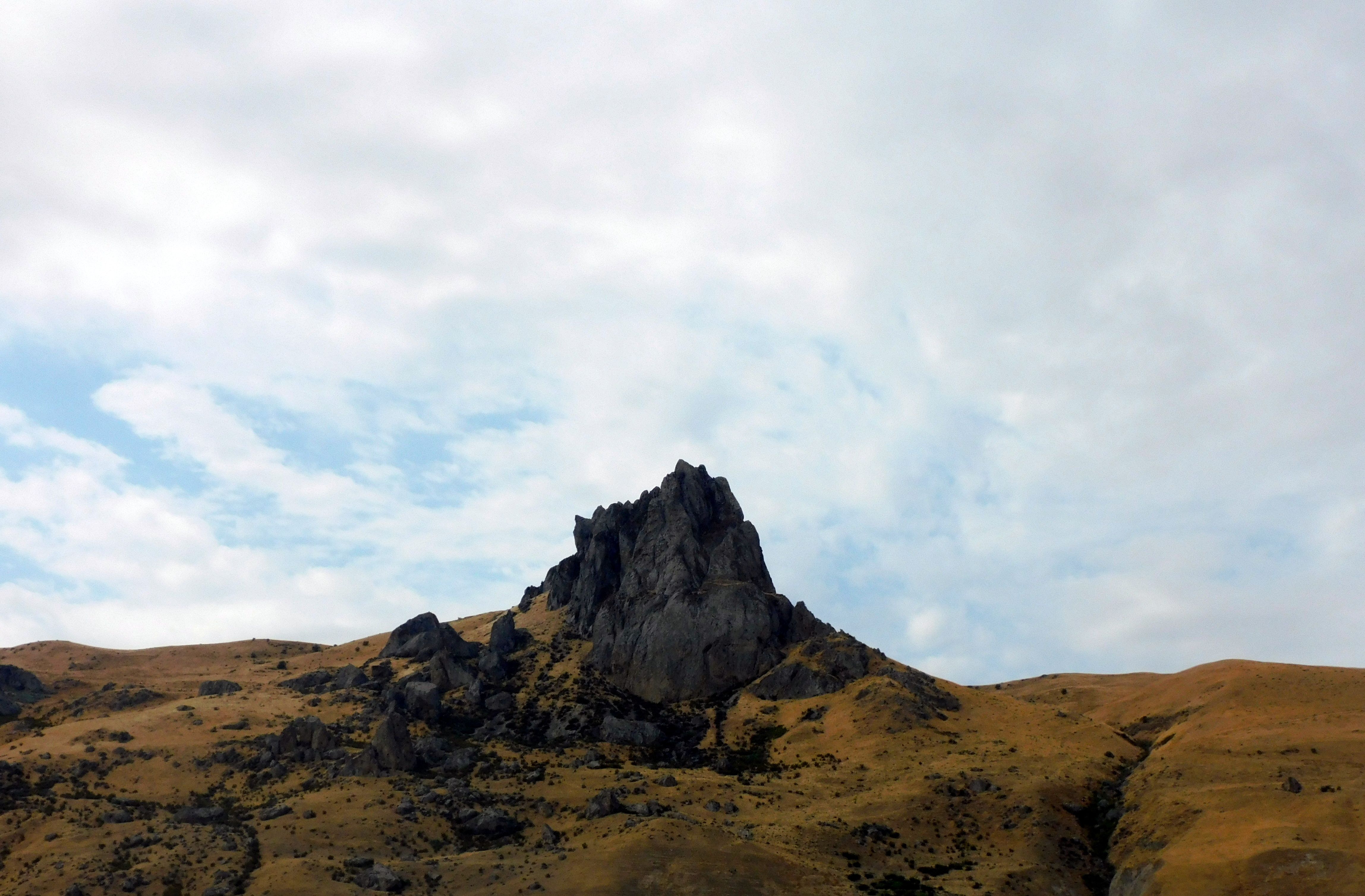 Gorgeous rock formation under a clear sky captured in Baku, Azerbaijan's picturesque landscape.