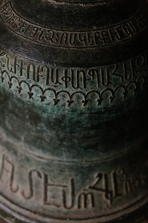 Free Big bell with shabby religious inscriptions Stock Photo