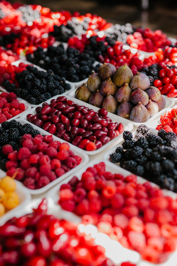 Fresh Berries On Trays In Market