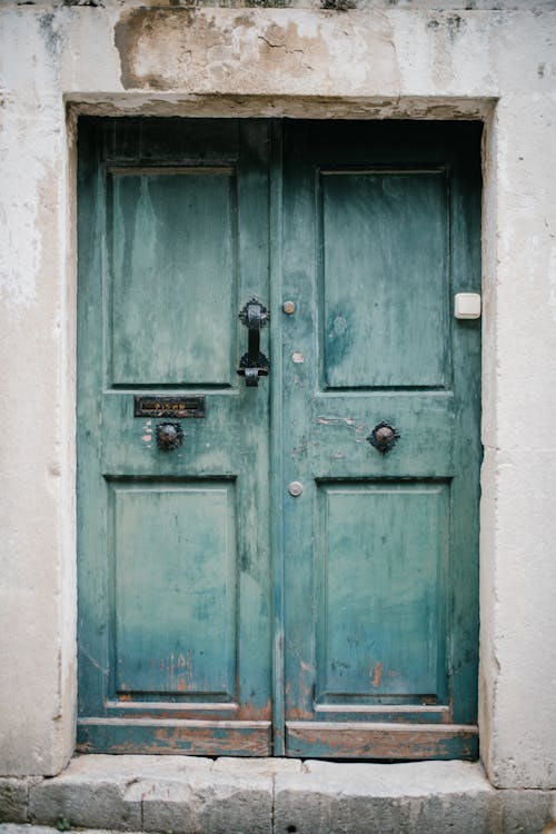 Free Vintage blue door of old building Stock Photo