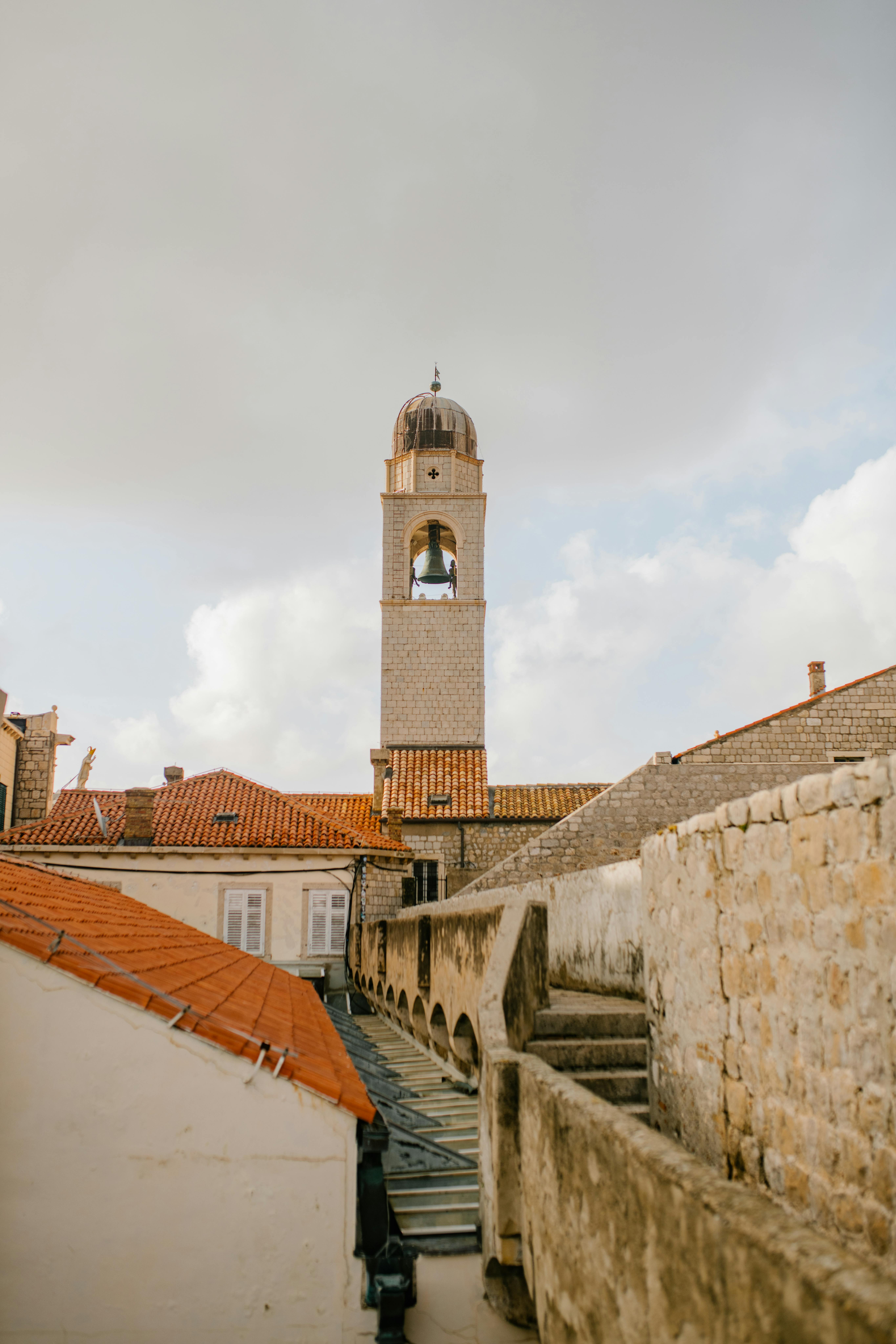 old stone castle with tower in city