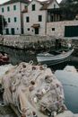 Old boat and fishing nets on waterfront