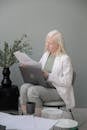 Serious albino woman working with documents