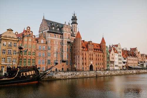 Old European city district on river coast