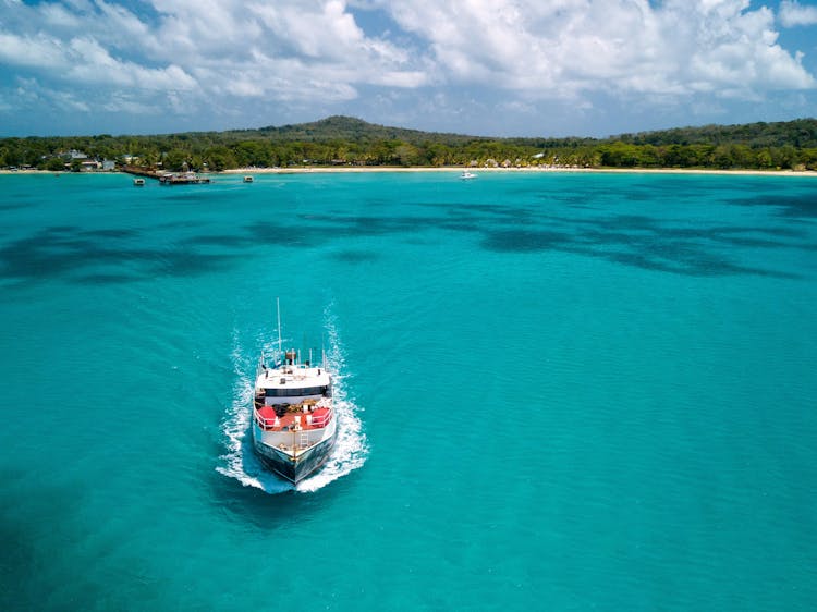 A Boat On The Turquoise Water