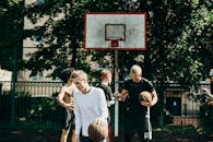 People Playing Basketball on the Street