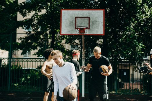 People Playing Basketball on the Street