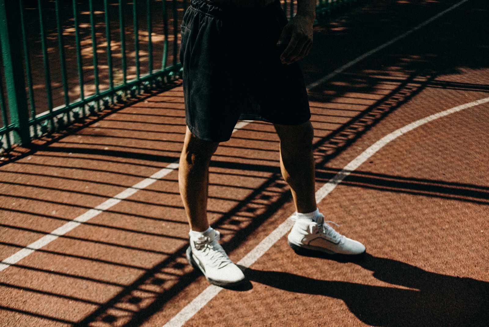 Person adjusting knee-high compression socks before a day of walking