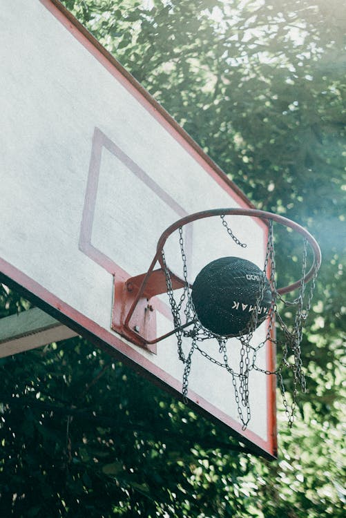 Basketball on Basketball Hoop