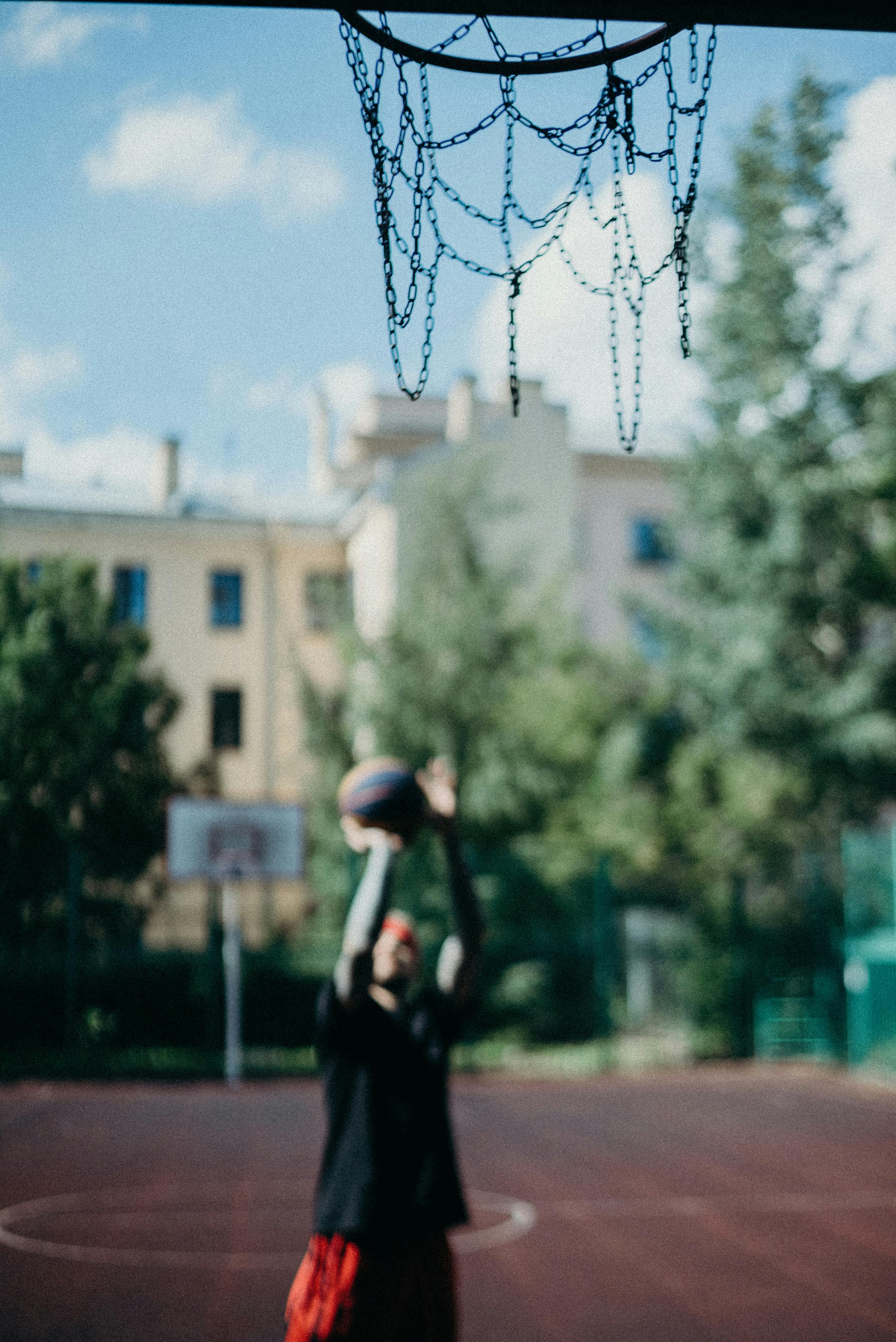low angle photography of a basketball hoop