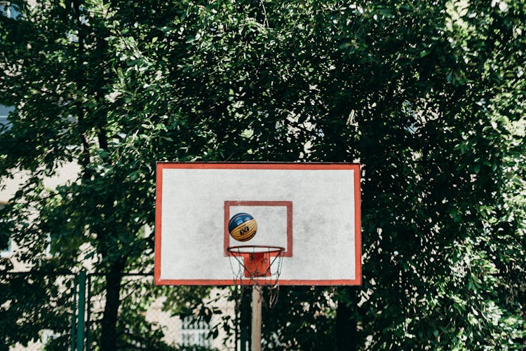 Ball On The Basketball Hoop 