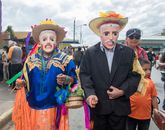 Festival attendees in vibrant costumes celebrate Diriamba's cultural dance tradition.