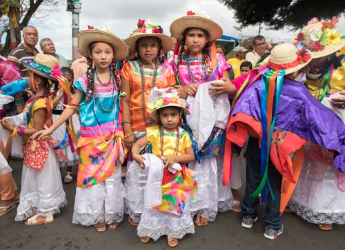 Free Colorful traditional costumes worn by children during a festival in Diriamba, Nicaragua. Stock Photo