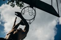 Low Angle Photography of Basketball Dunk