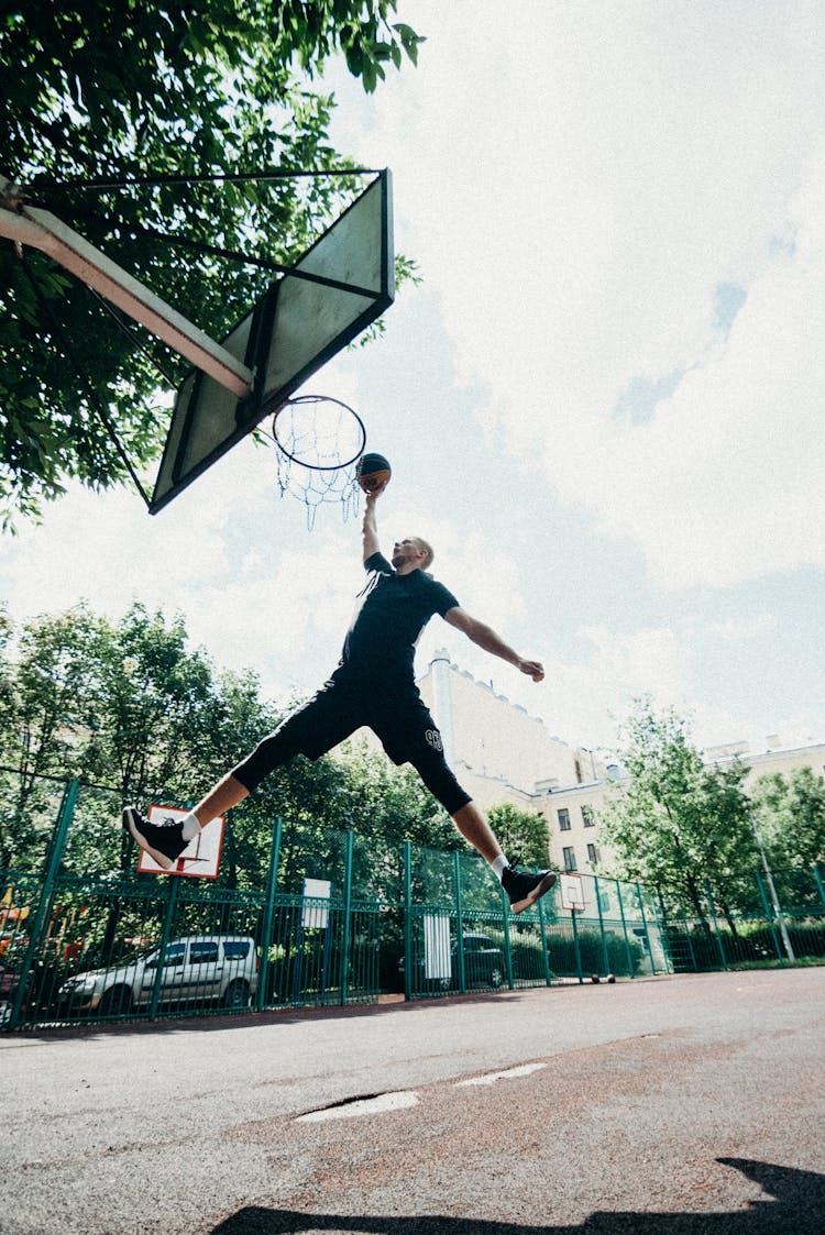 Jump Shot Of A Person Playing Basketball