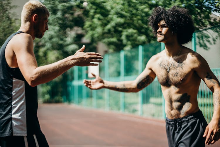 Basketball Players Slapping Hands