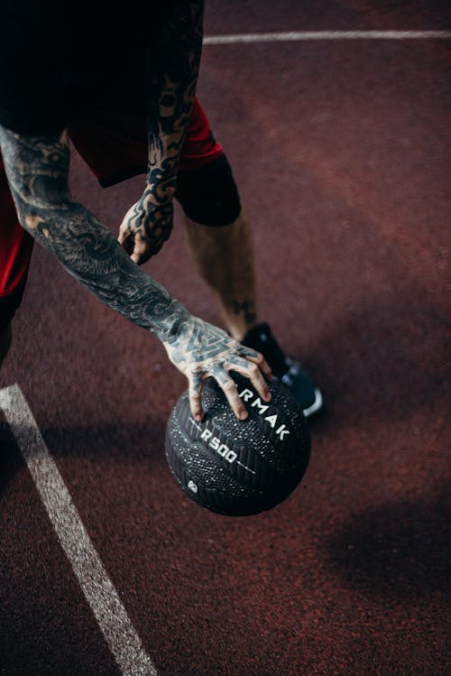 A Man Playing Basketball