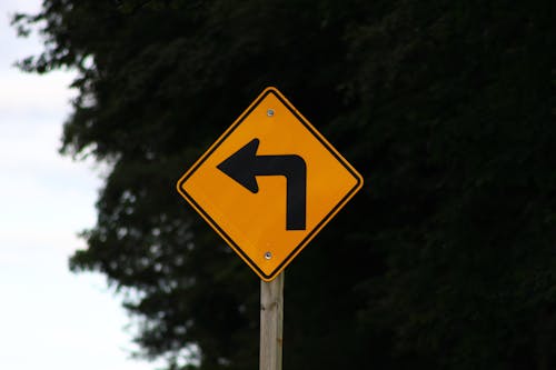 Close-Up Shot of a Road Sign