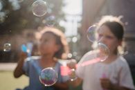 Woman Blowing Bubbles