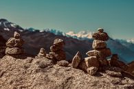 Stones placed on rocky cliff