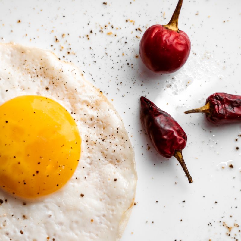Charred Halloumi, Egg and Chili Crisp on Pita Soufflé
