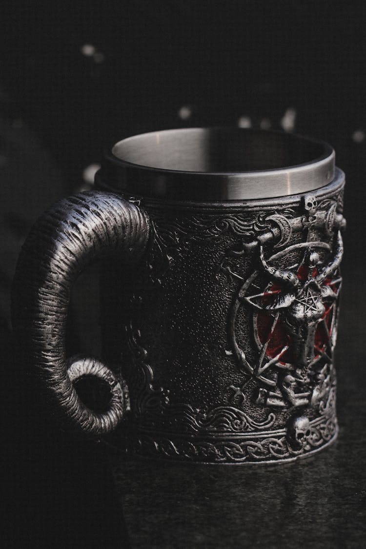 Gray Metal Mug With Creepy Design