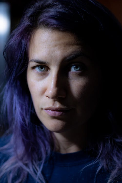 A Portrait of a Woman with Purple hair