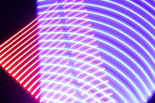 A dynamic display of intertwining neon lights creating a vivid abstract pattern.