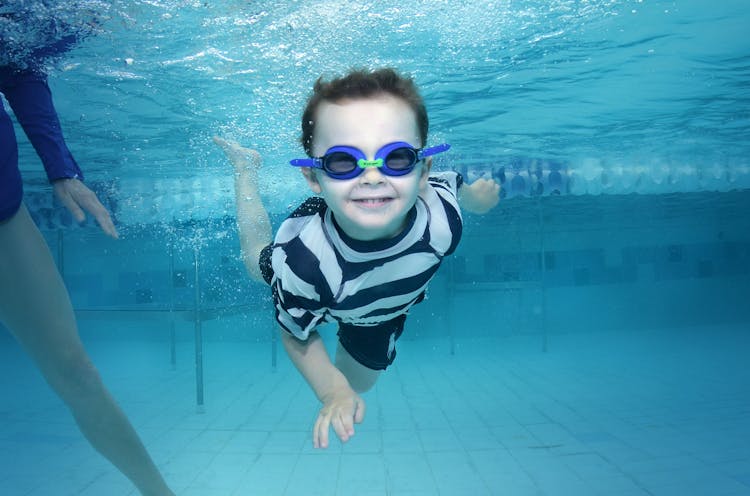 A Boy Swimming Underwater